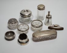 Eight assorted silver topped toilet jars, a silver mounted nail buffer and pen wipe.