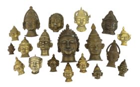 A group of eighteen bronze or brass Shiva masks, Southern India, 16th-19th century, 6.2 - 19.5cm