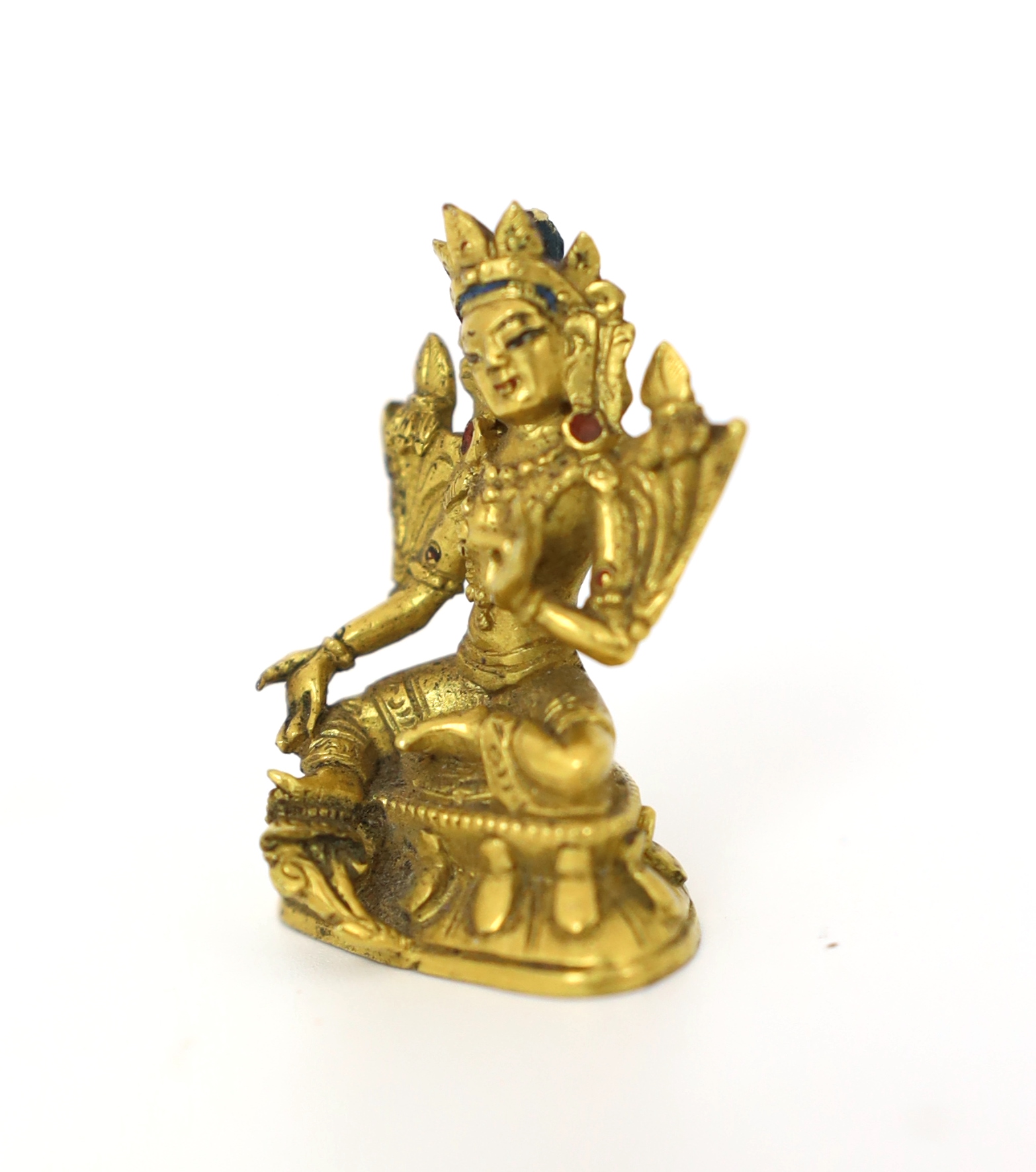 * * A Tibetan miniature gilt bronze figure of Green Tara, 18th/19th century, 3cm highProvenance: - Bild 3 aus 6