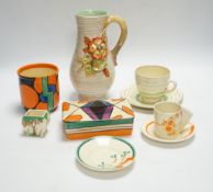 A Clarice Cliff Fantasque butter dish and cover, a Bizarre pot and five other Clarice Cliff items,