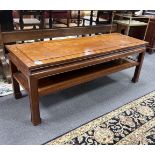 A Chinese rectangular hardwood two tier coffee table, width 122cm, depth 43cm, height 46cm