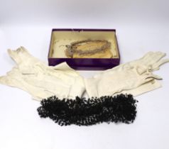 Cream leather evening gloves, bonnet veiling and decorative bridal headdress