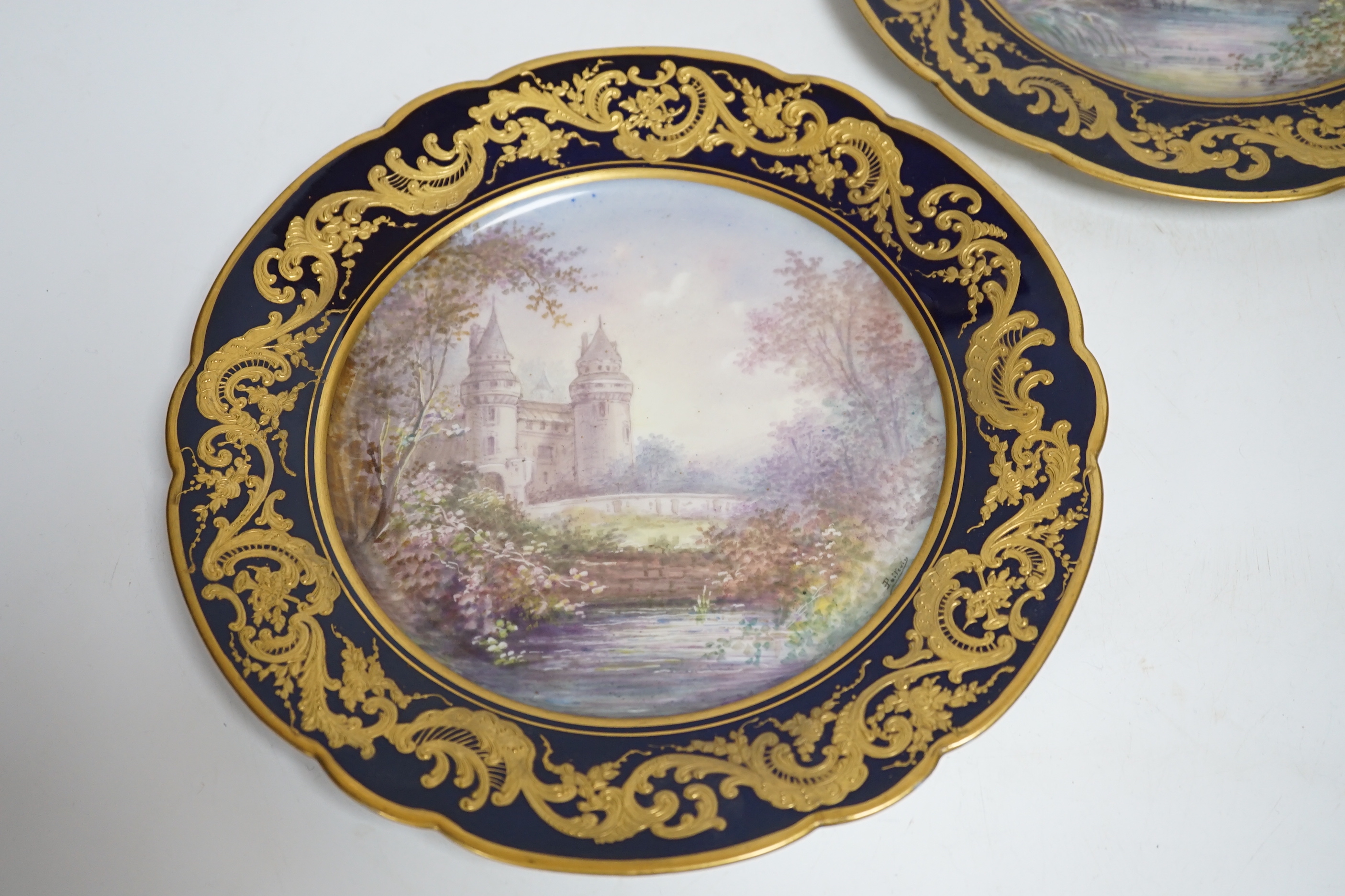 A pair of Sevres style blue cabinet plates, each decorated with a chateau, 24.5cm diameter - Image 3 of 4