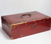 A Victorian red Morocco dispatch box (locked with no key)