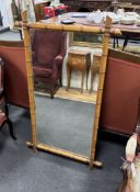 A late 19th early 20th century French rectangular simulated bamboo cherry wall mirror, width 72cm,