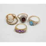 Five assorted modern 9ct and gem set dress rings, including graduated five stone amethyst and