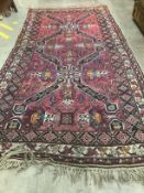 A Caucasian carpet, 330 x 180cm