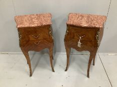 A pair of Louis XVI style gilt metal mounted inlaid kingwood marble topped bombe bedside chests,