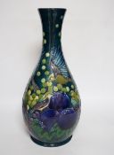 A large boxed Moorcroft vase, ‘Finches pattern’, on a dark blue-green ground, bell date mark to