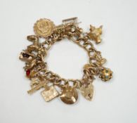 An early 1960's 9ct gold curb link charm bracelet, hung with fifteen assorted charms, including