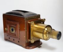 A late Victorian brass mounted mahogany magic lantern by Dunscombe, Bristol with a small quantity of