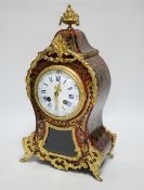 A French red boulle mantel clock, with French movement, striking on a coiled gong, height, 36cm