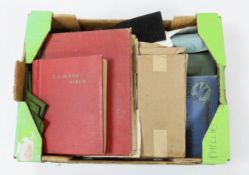 A box of mixed stamp albums