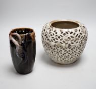 A reticulated art pottery vase and another pottery vase, largest 15cm high