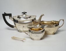 A George V three piece silver tea set by Robert Pringle & Sons, London, 1933, with engraved