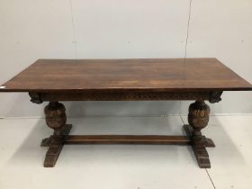 An 18th century style rectangular oak refectory dining table, width 183cm, depth 83cm, height 77cm