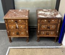A pair of late 19th century French marquetry inlaid rosewood marble topped bedside chests