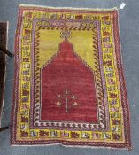 An Anatolian mustard ground prayer mat, 130 x 103cm