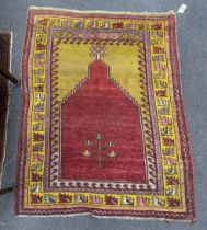 An Anatolian mustard ground prayer mat, 130 x 103cm