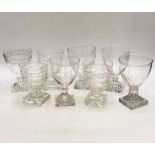 Three late 19th early 20th century square base wine glasses, three similar etched glasses and