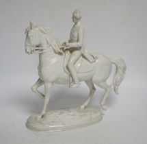 An Augarten, Wien white glazed porcelain Spanish Riding School Group, 24cm