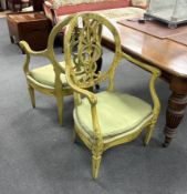 A set of four late 18th century Continental green painted elbow chairs, width 62cm, depth 50cm,