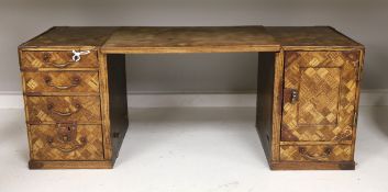 An early 20th century Japanese parquetry table cabinet or scholar's box, 24.5cm high, 63cm wide when