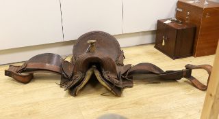 An early 20th century European leather mounted saddle