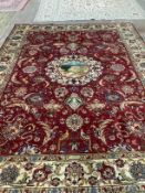 A Tabriz mid ground carpet, 320 x 220cm