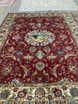 A Tabriz mid ground carpet, 320 x 220cm