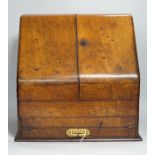 A Victorian walnut stationery box with pull out writing slope, ivory labels, 41cm wide CITES