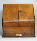 A Victorian walnut stationery box with pull out writing slope, ivory labels, 41cm wide CITES