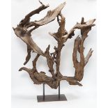 A naturalistic wood sculpture on stand, 66cm high