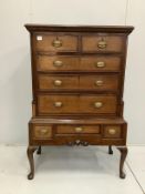 A George III mahogany banded oak chest on stand, width 97cm, depth 51cm, height 152cm