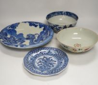 Assorted Chinese and Japanese ceramics comprising a famille rose bowl, two blue and white plates and