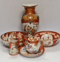 A group of Japanese Kutani porcelain wares including two bowls and a large vase, largest 34cm high