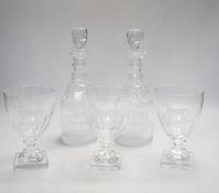 A suite of George III-style drinking glassware, consisting of a pair of decanters and stoppers and