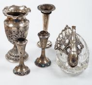 Two small white metal candlesticks, 8cm, an Indian vase, silver posy vase and a white metal
