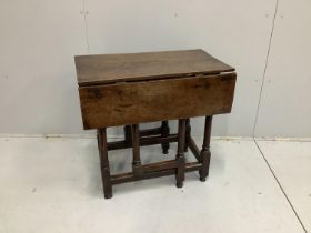 An 18th century oak drop flap table, width 46cm, depth 76cm, height 72cm