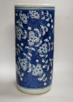 An early 20th century Chinese blue and white prunus stick stand, 44cm