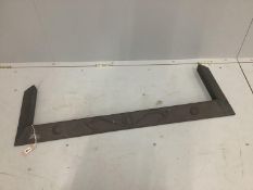 An Arts & Crafts hammered copper fender, length 115cm