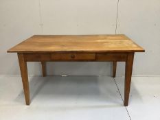 An early 20th century oak kitchen table with frieze drawer, width 148cm, depth 89cm, height 74cm