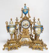 A Sevres style porcelain and gilt metal clock garniture, 44cm high