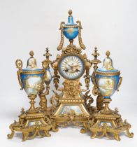 A Sevres style porcelain and gilt metal clock garniture, 44cm high