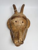 A carved wood antelope head mask, Burkina Faso?