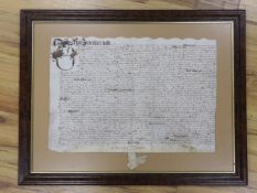 A Commonwealth period vellum indenture, dated 1652, framed, 37 x 54cm