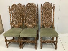 A matched set of six Louis XIV style carved oak high back dining chairs, width 46cm, height 124cm