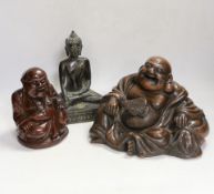 A bronze Thai Buddha, a composite Japanese Hotei and a carved wood example, tallest 20cm