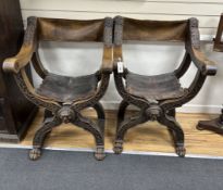 * * A pair of 19th century Italian Savonarola ‘’X’’ framed elbow chairs, with leather backs and