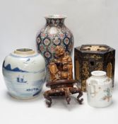 A group of Chinese items including a hardwood carving of luohan, an 18th century blue and white jar,